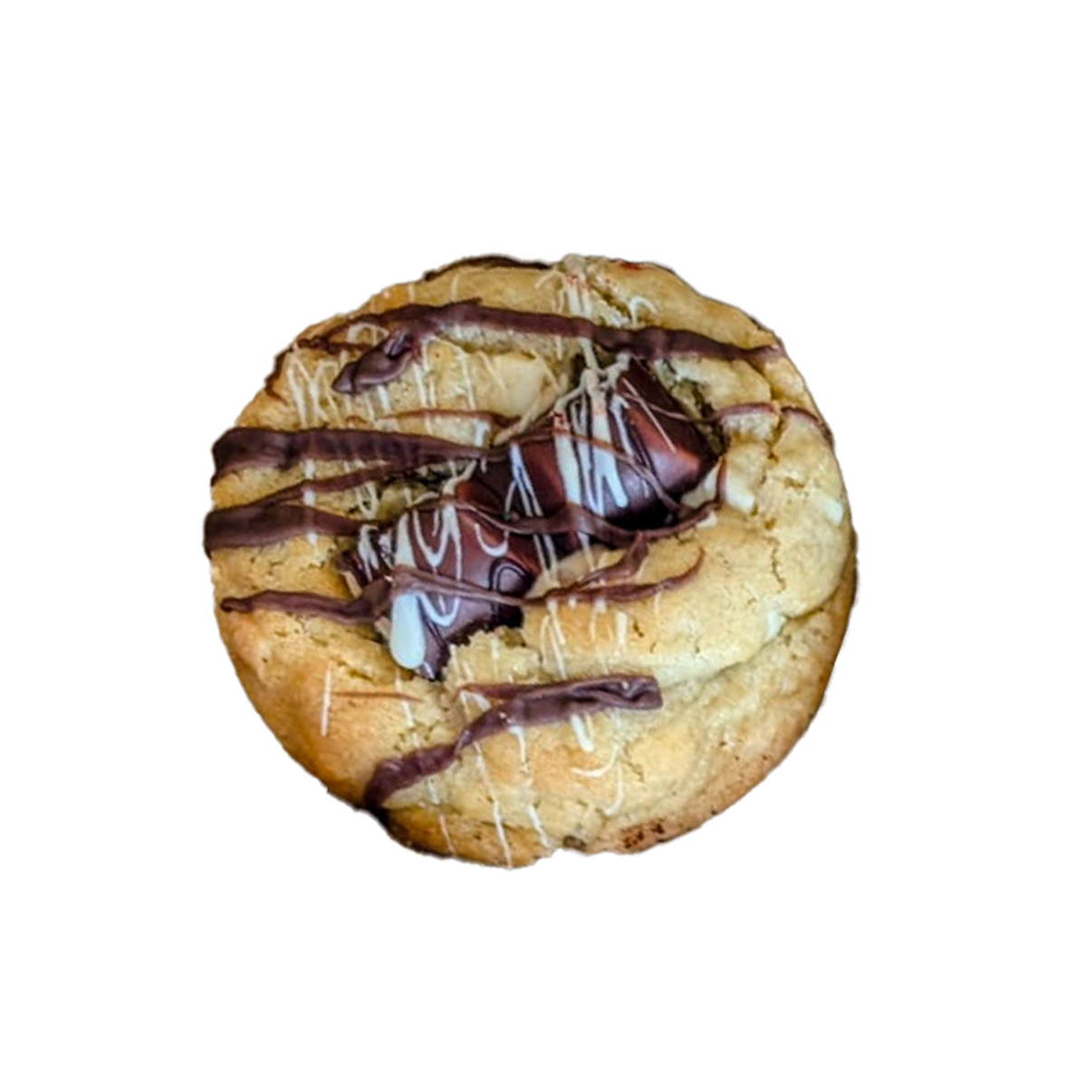 Picture of a white chocolate chip cookie filled with a creamy white hazelnut centre, topped with a Kinder Bueno