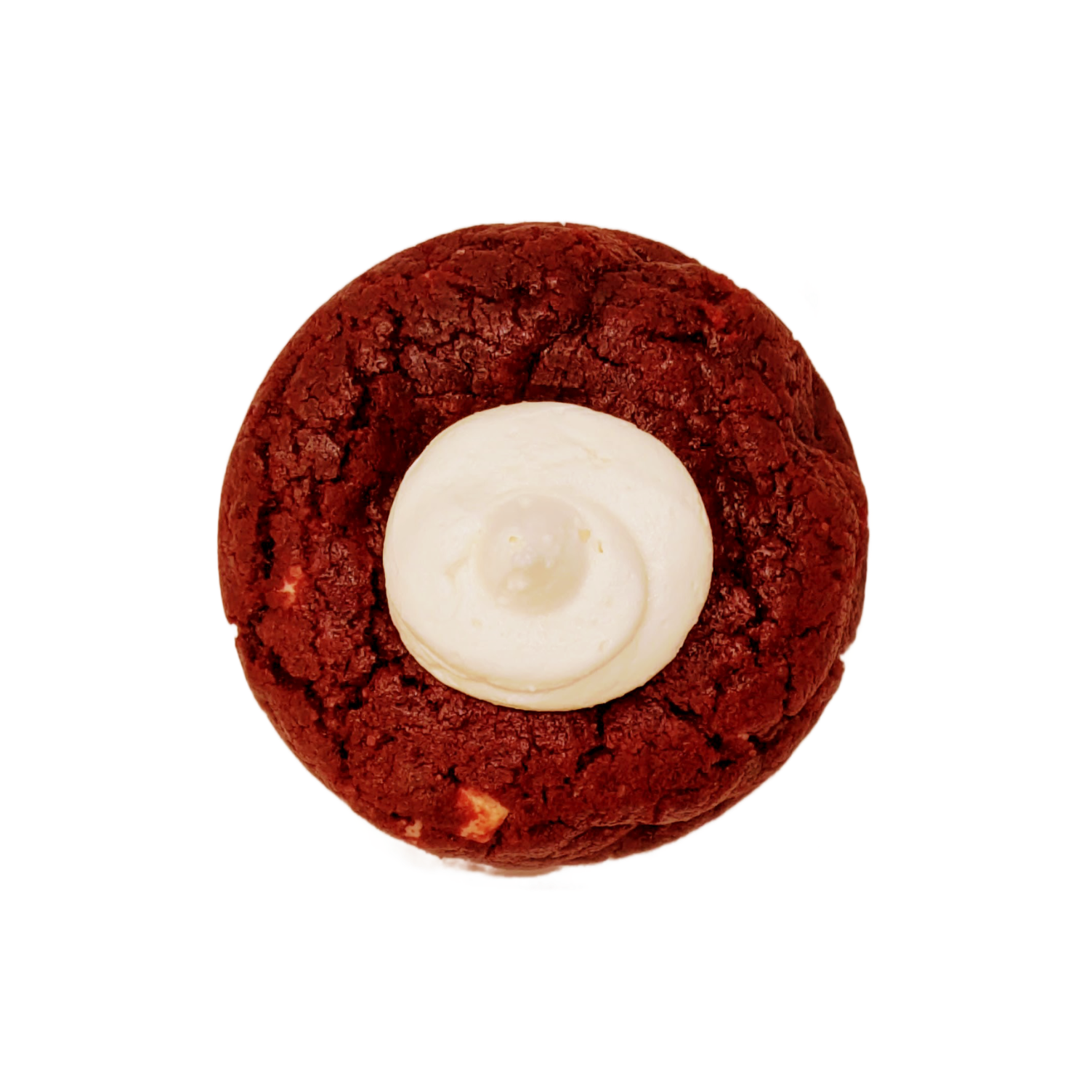 Picture of a red vanilla cookie stuffed with white chocolate chunks and a center topping of cream cheese
