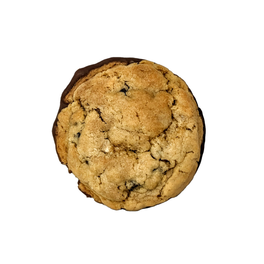 Picture of a cookie stuffed with milk, dark and white chocolate, dipped in milk chocolate